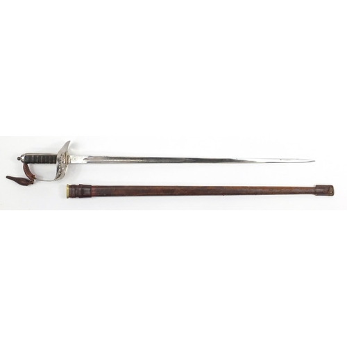 577 - British Military Calvary sword by Sanderson Bros & Newbould of Sheffield, with leather scabbard and ... 