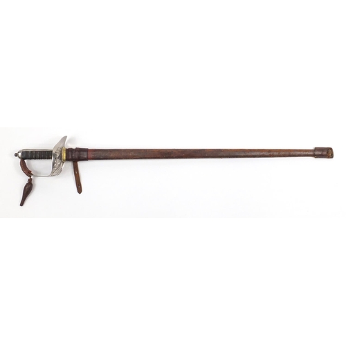 577 - British Military Calvary sword by Sanderson Bros & Newbould of Sheffield, with leather scabbard and ... 