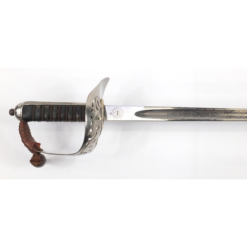 577 - British Military Calvary sword by Sanderson Bros & Newbould of Sheffield, with leather scabbard and ... 