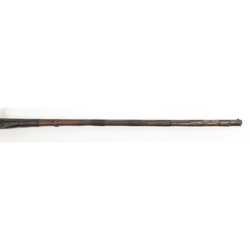 583 - Indian flint lock rifle with bone inlay and a similar pistol, the largest 160cm in length