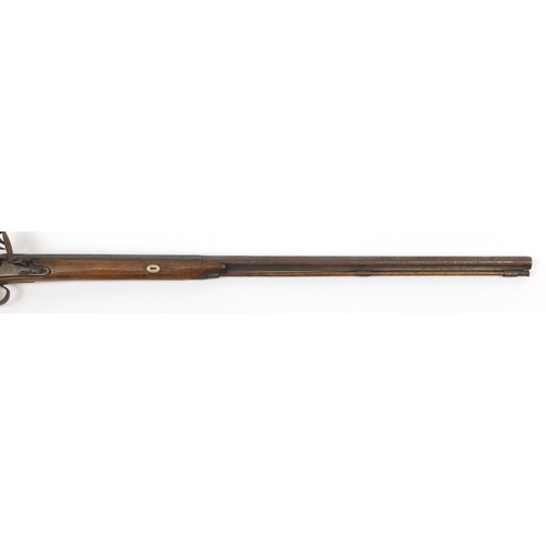 581 - 19th century flint lock rifle, the barrel with impressed proof marks, 126cm in length