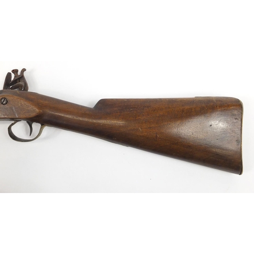 581 - 19th century flint lock rifle, the barrel with impressed proof marks, 126cm in length