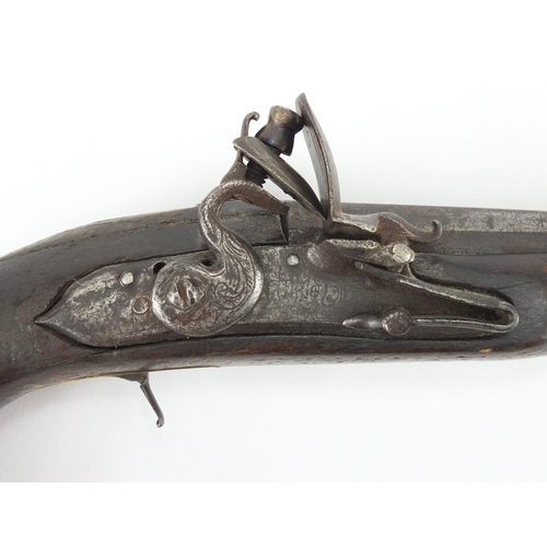 586 - 19th century flintlock pistol with engraved steel lock, 39cm in length