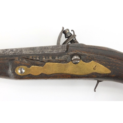 586 - 19th century flintlock pistol with engraved steel lock, 39cm in length