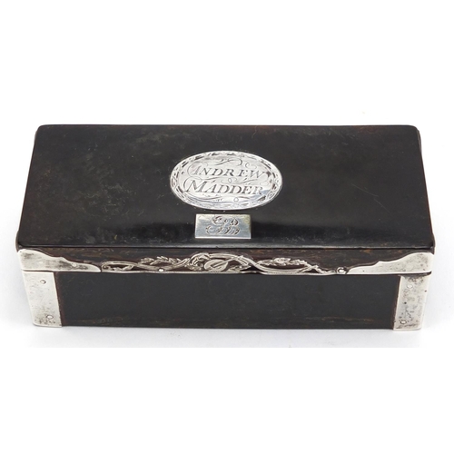 18 - 18th century rectangular tortoiseshell snuff box with silver mounts, the hinged lid with silver cart... 