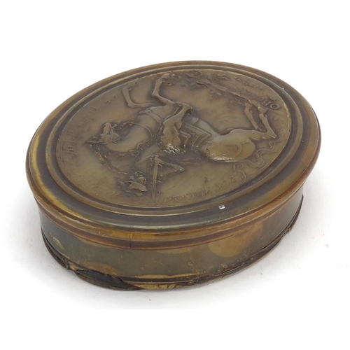26 - John Obrisset oval pressed horn snuff box, the lid depicting George II before battleships, impressed... 