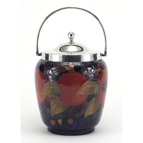 943 - Moorcroft Pomegranate pattern pottery biscuit barrel, with silver mounts and swing handle, impressed... 