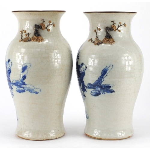 598 - Pair of Chinese crackle glaze vases, with naturalistic twin handles, each hand painted with an elder... 