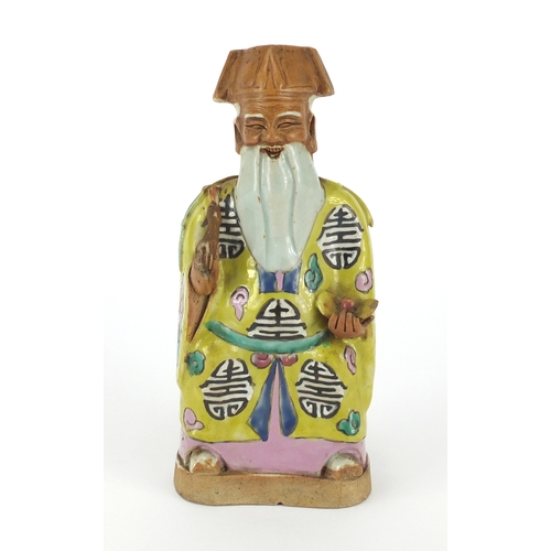 645 - Chinese pottery Emperor hand painted in the famille rose palette, 21.5cm high