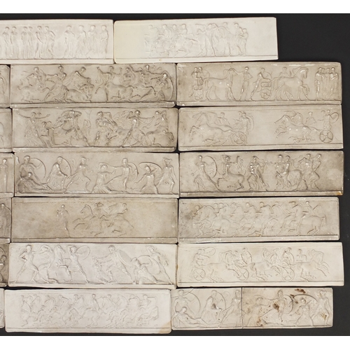 962 - Thirty two classical plaster casts of the Parthenon frieze, after John Hennings, each 23.5cm x 6cm