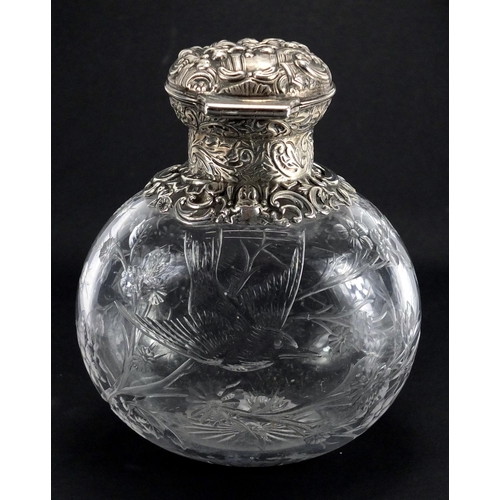 103 - Victorian silver topped Webb rock crystal scent bottle by William Comyns, finely etched with a bird ... 