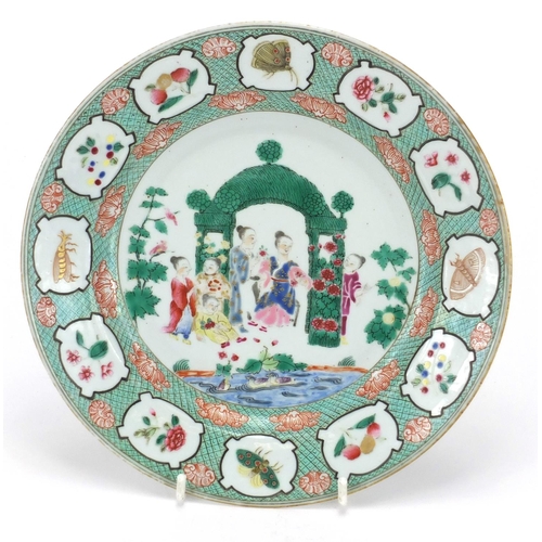 625 - Chinese porcelain plate, finely hand painted in the famille verte palette with a family by a pond wi... 