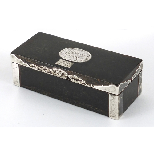 18 - 18th century rectangular tortoiseshell snuff box with silver mounts, the hinged lid with silver cart... 