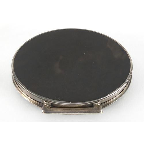 21 - 18th century oval silver and tortoiseshell snuff box, the hinged tortoiseshell pique work lid decora... 