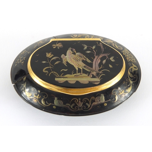 24 - 18th century oval tortoiseshell and gold pique work snuff box with gold mounts, decorated with a bir... 