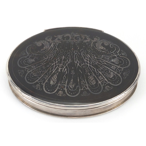 21 - 18th century oval silver and tortoiseshell snuff box, the hinged tortoiseshell pique work lid decora... 