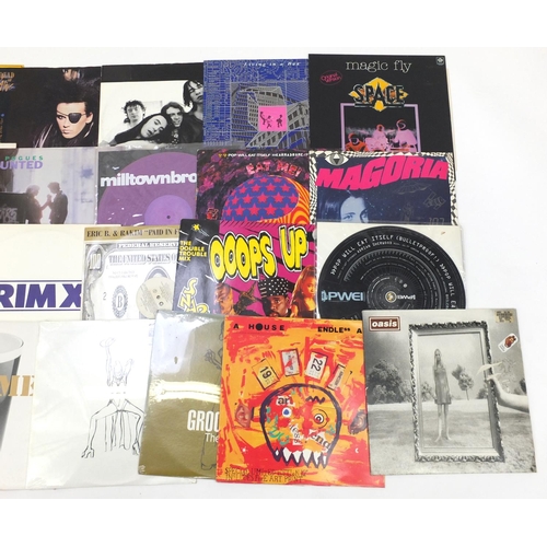 2768 - 12 inch and 10 inch vinyls including Depeche Mode, The Stone Roses, Oasis and Groove Thing, housed i... 