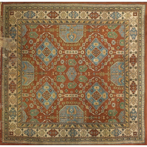 39 - Persian Kasak design carpet, approximately 276cm x 270cm