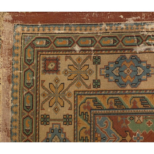 39 - Persian Kasak design carpet, approximately 276cm x 270cm