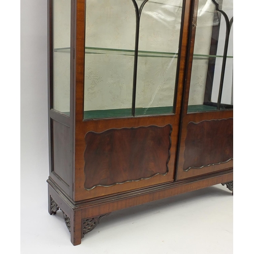 41 - Mahogany display cabinet with two glass shelves and cupboard base, 150cm H x 118cm W x 35cm D