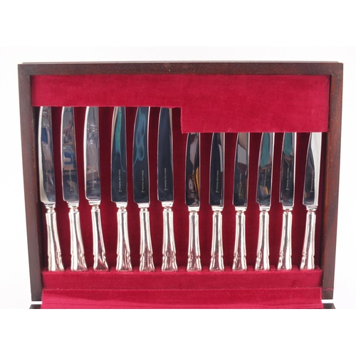 2022 - Walker & Hall mahogany six place canteen of Sheffield silver plated cutlery, the canteen 40cm wide