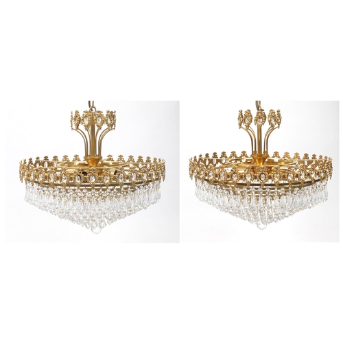 2024 - Pair of brass seven tier chandelier with glass drops, 35cm high x 39cm in diameter