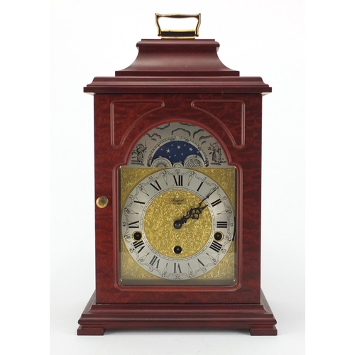 2056 - Rapport Westminster chiming mantel cock, with moon phase dial and silvered chapter ring, 34cm high