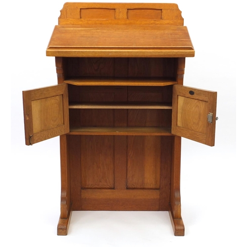 27 - Oak Lectern with Bobby & Co furniture Eastbourne label, 128cm high