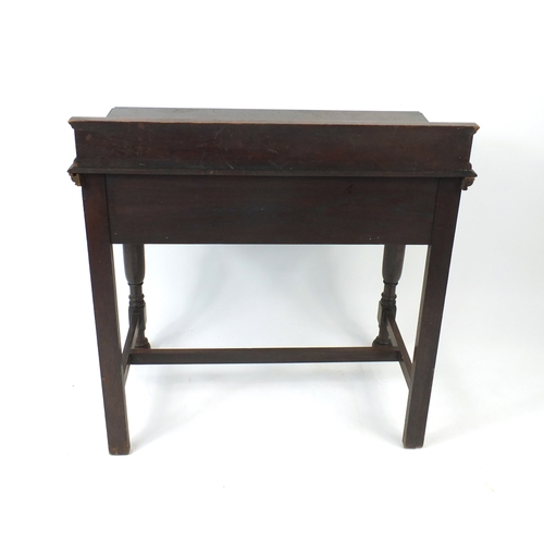 57 - Carved oak hall table, fitted with a frieze drawer, 95cm H x 92cm W x 50cm D