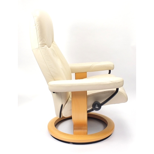 15B - Stressless Ekornes cream leather chair with footstool