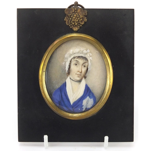 14 - 19th century oval hand painted portrait miniature of a female wearing a bonnet, housed in a rectangu... 