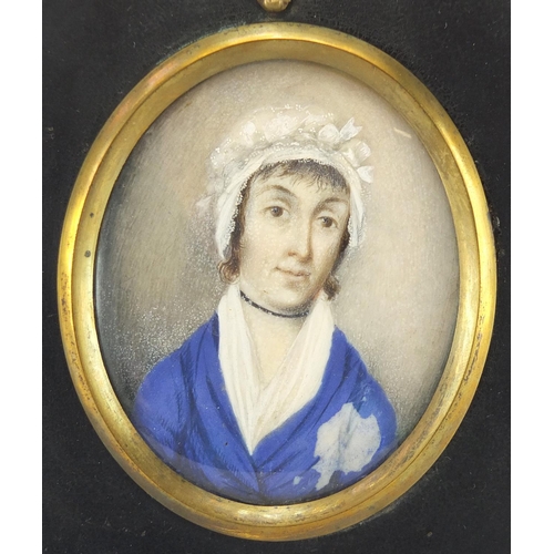 14 - 19th century oval hand painted portrait miniature of a female wearing a bonnet, housed in a rectangu... 