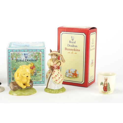 775 - Royal Doulton Bunnykins items including two figures with boxes and two Royal Doulton Winnie the Pooh... 