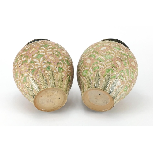 501 - Pair of Doulton Slaters stoneware vases, 21.5cm high