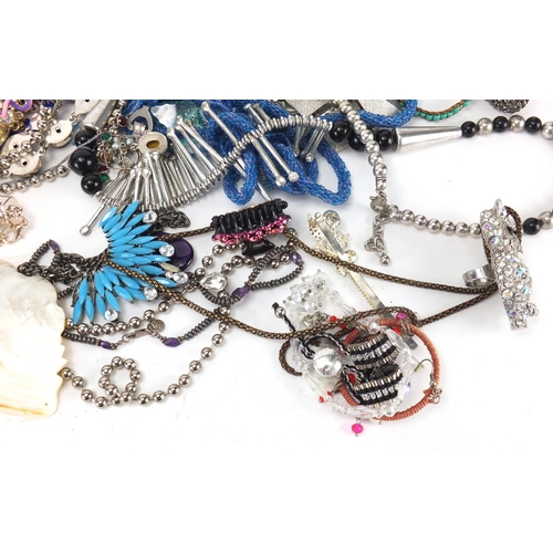 351 - Costume jewellery,including silver examples, mostly necklaces, rings and bracelets