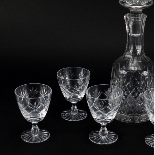 554 - Cut glass decanter and six glasses