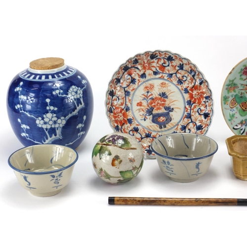 613 - Oriental ceramics and a brush including a blue and white ginger jar and Yixing cup and cover, the la... 