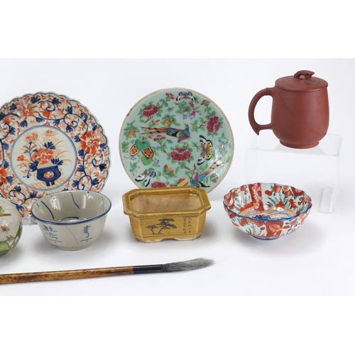 613 - Oriental ceramics and a brush including a blue and white ginger jar and Yixing cup and cover, the la... 