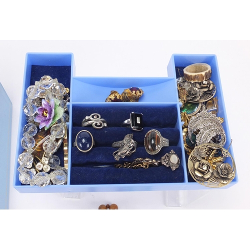 338 - Costume jewellery including some silver, housed in a musical jewellery box