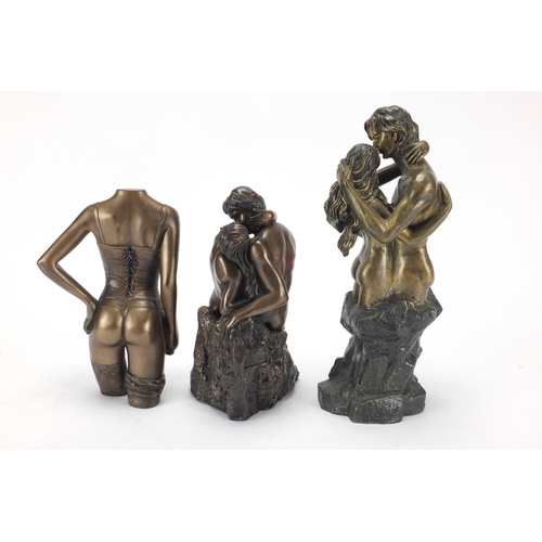 182 - Two bronzed erotic figure groups and one other, the largest 30cm high