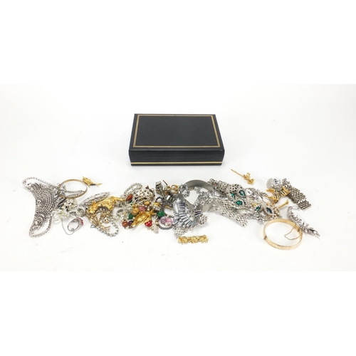 361 - Costume jewellery including animal brooches, necklaces and a gold plated bangle