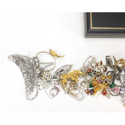 361 - Costume jewellery including animal brooches, necklaces and a gold plated bangle