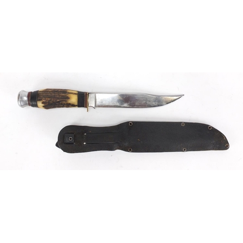 908 - Horn handled hunting knife, the blade stamped Whitby Solingen Germany, with leather sheath