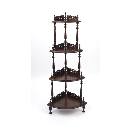 41 - Carved Mahogany four tier corner whatnot, 144cm high
