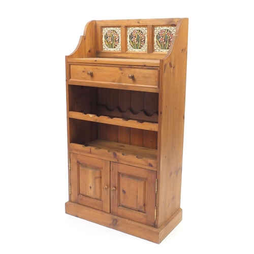 43 - Pine wine rack with tiled back and cupboard base, 103cm high