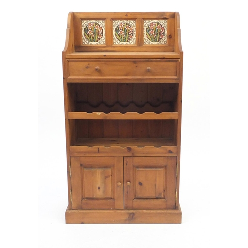 43 - Pine wine rack with tiled back and cupboard base, 103cm high