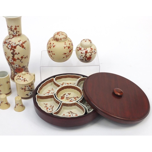 687 - Hand painted Oriental porcelain, including a sectional Lazy Susan, teapot and ginger jars