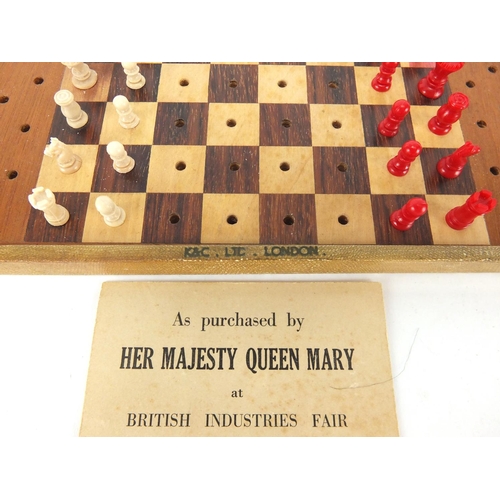 459 - Miniature travel chess set, 21.5cm in length