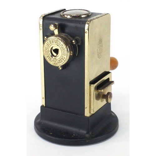 392 - Spanish brass desk mounted pencil sharpener, 15cm high