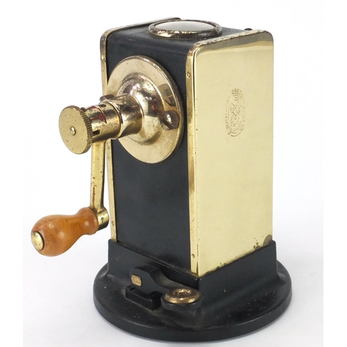 392 - Spanish brass desk mounted pencil sharpener, 15cm high